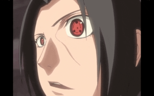 a close up of a cartoon character 's face with red eyes