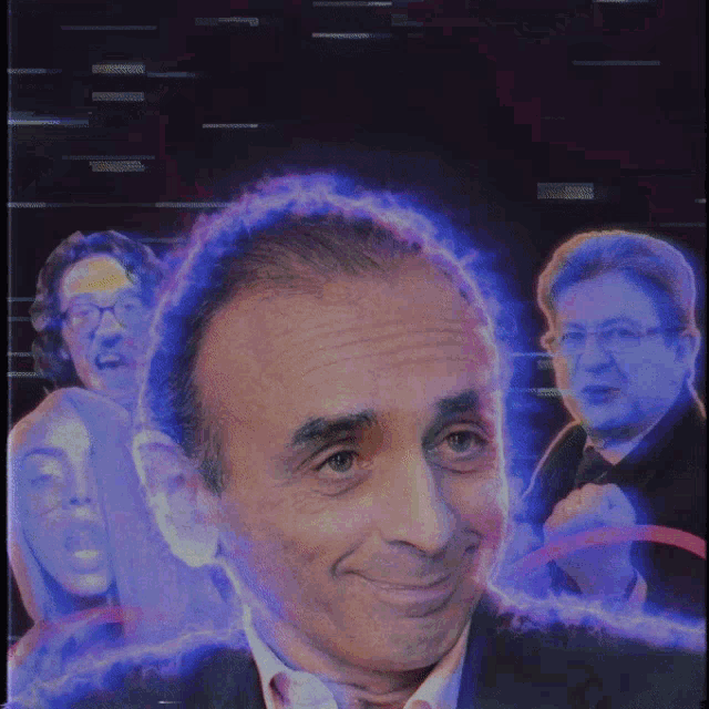 a man in a suit is smiling in front of a sign that says doy
