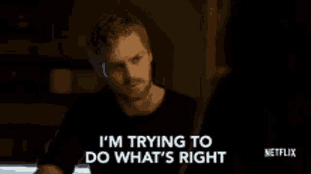 a man is saying i 'm trying to do what 's right in a dark room .