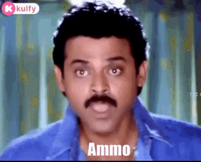 a man with a mustache and a blue shirt is making a funny face and saying ammo .