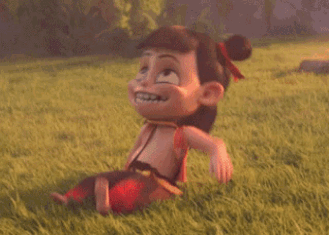 a cartoon character is laying on the grass laughing .