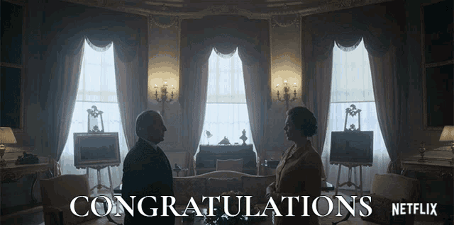 a man and woman standing in a room with congratulations written on the bottom