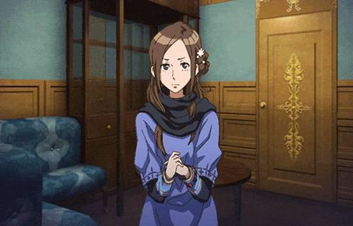 a girl in a blue dress with a flower in her hair