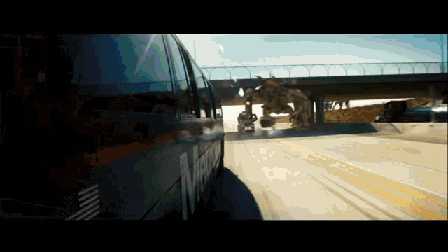 a bus with the word new written on the side