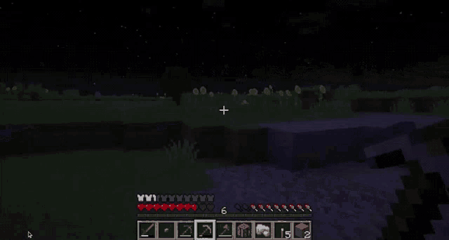 a screenshot of a video game called minecraft with a cross in the middle of the screen