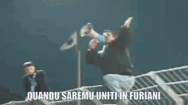 a group of people standing in front of a building with the words " quando saremu uniti in furiani " written on the bottom