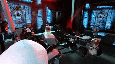 a man is laying in a hospital bed in a room with a red cross on it .