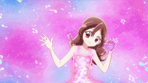 a girl in a pink dress is holding a crystal