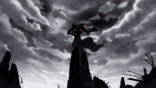 a silhouette of a cat with red eyes standing on top of a rock
