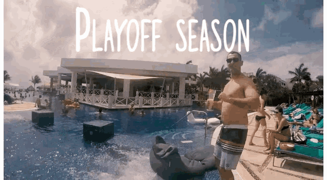 a man holding a drink in front of a swimming pool with the words playoff season written above him