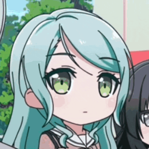 a close up of a cartoon character with green eyes and blue hair .