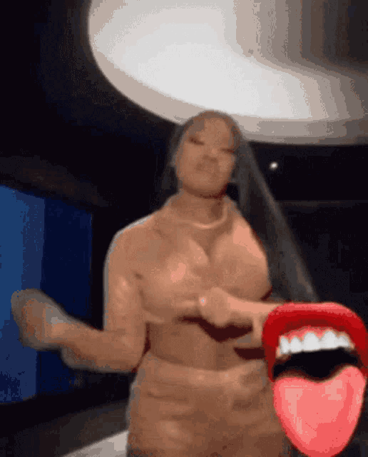 a woman with long black hair is dancing with a red tongue sticking out of her mouth