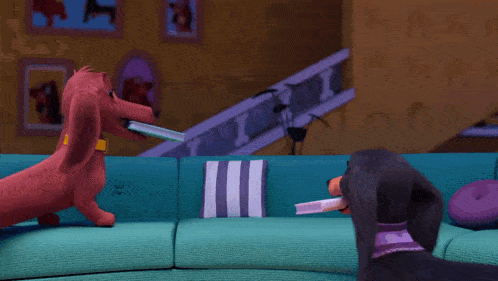 two stuffed dachshunds are sitting on a couch with a remote control