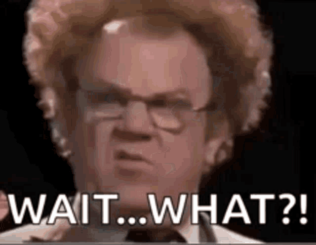 a man with curly hair and glasses is making a funny face and saying `` wait what ? ''