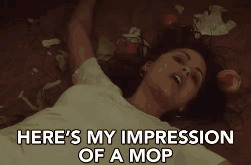 a woman is laying on the floor with fruits and leaves around her and the words here 's my impression of a mop above her