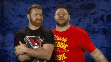 two men wearing red shirts that say classy freddie