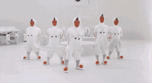 a group of people are dancing with the words oompa loompa fc on the bottom