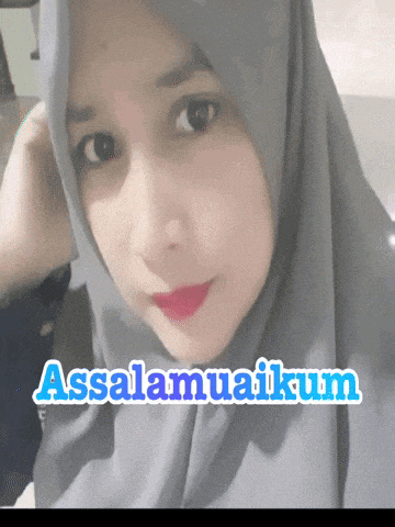 a woman wearing a hijab with the words assalamualaikum written above her