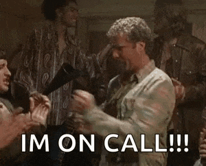 a man in a plaid shirt is dancing in a room with other men .