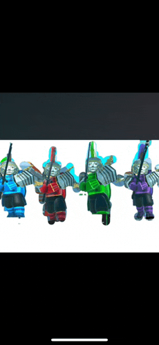 a group of ninjas are standing next to each other with swords in their hands .