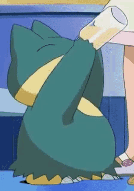 a cartoon character is drinking a glass of orange juice .