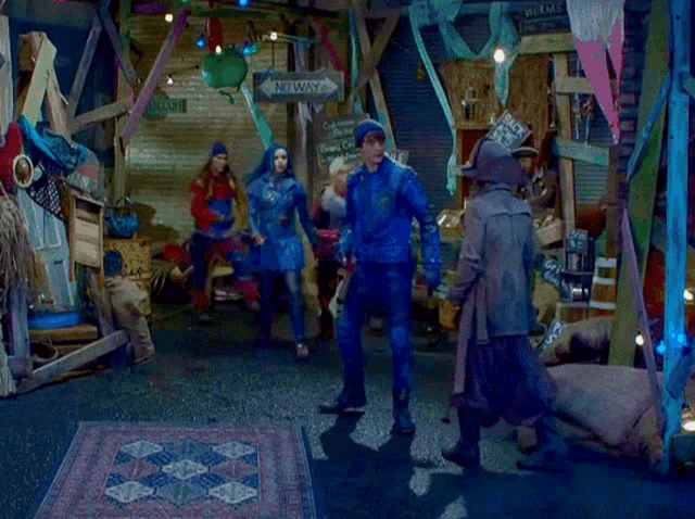 a group of people standing in a room with a sign that says no way