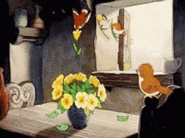 a vase of yellow flowers sits on a table