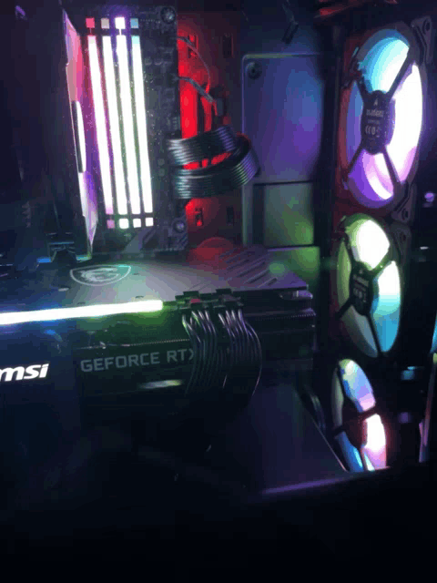 a msi geforce rtx graphics card is sitting on top of a computer