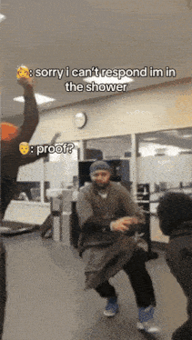 a man dancing in a room with a caption that says " sorry i can 't respond im in the shower "
