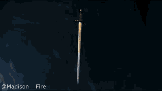 a picture of a sword with the name madison fire on it