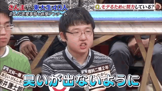 a man with glasses and a name tag that says " 2 "