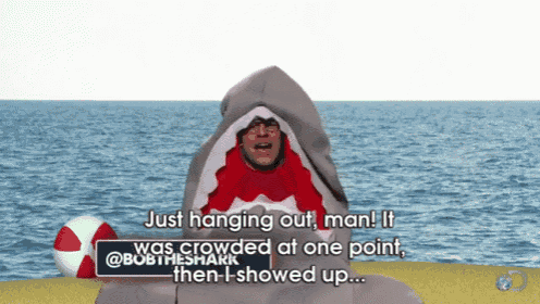 a man in a shark costume says just hanging out man it was crowded at one point then showed up