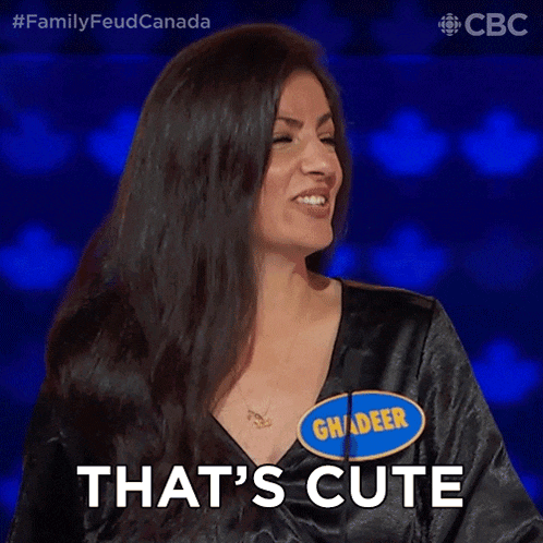 a woman wearing a name tag that says ghader