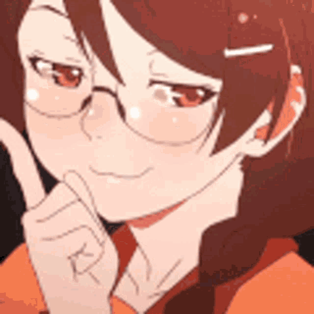 a close up of a girl wearing glasses making a silly face .