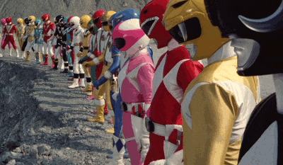 a row of power rangers are lined up in a line