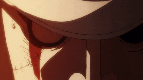 a close up of a person 's face with blood coming out of their eyes