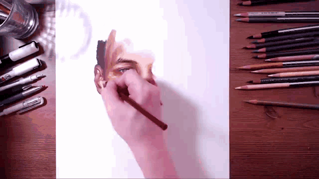 a drawing of a man 's face is being drawn with a pencil that says prismacolor