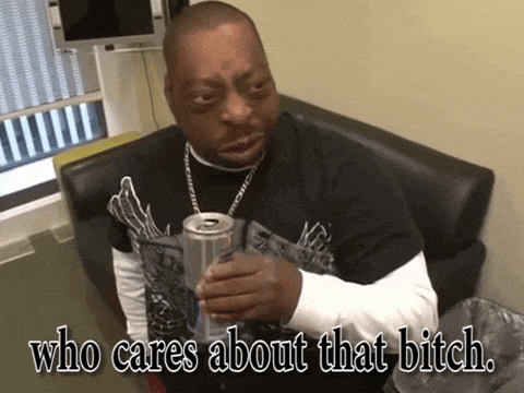 a man sitting on a couch holding a can of soda with the words who cares about that bitch below him