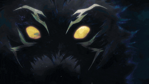 a drawing of a monster with glowing eyes and sharp teeth