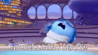 a cartoon character from inside out is sitting in a stadium and screaming .