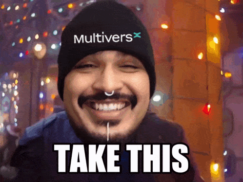a man wearing a beanie that says multivers x on it