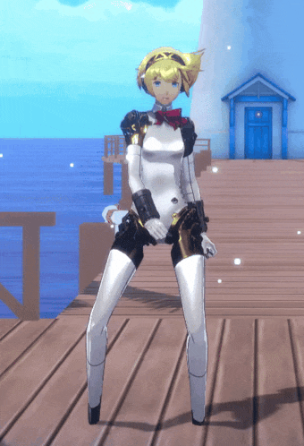 a girl with blonde hair is standing on a dock