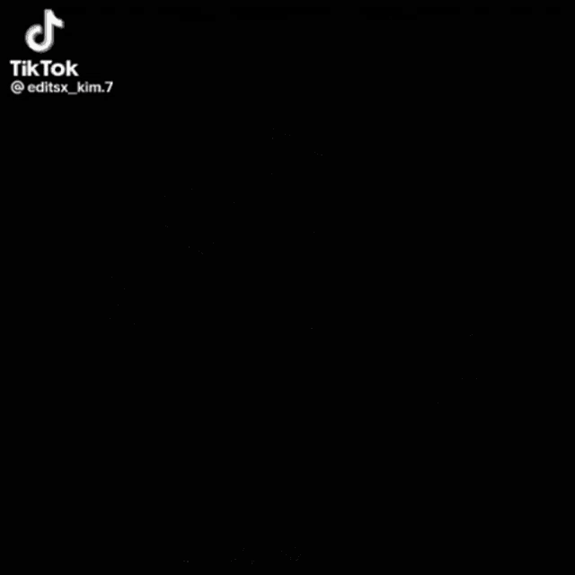 a man in a suit giving the middle finger with a caption that says tiktok