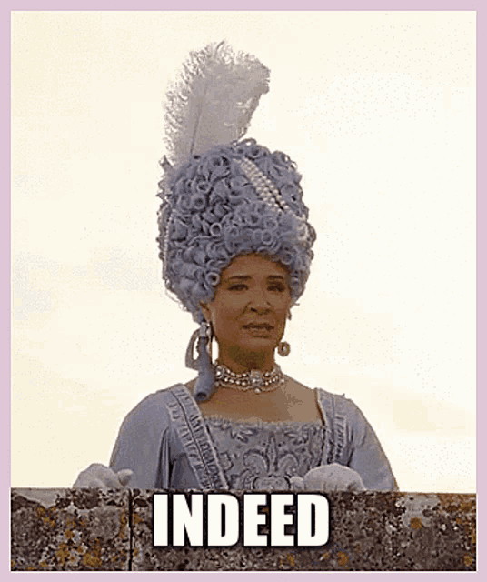 a woman in a blue wig is standing next to a sign that says indeed .