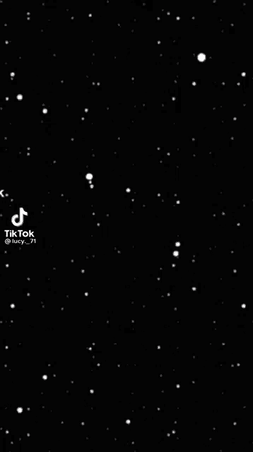 a white circle with the word love written on it is in the middle of a black background surrounded by stars .