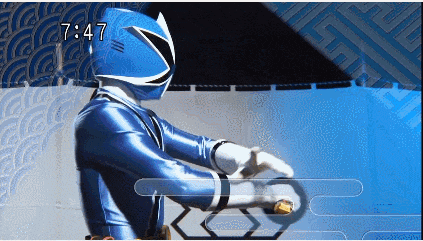 a blue power ranger with the time 7:47 on the bottom