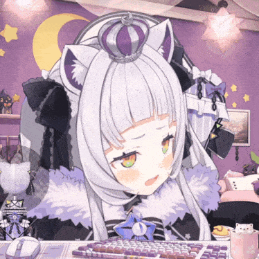 a girl with a crown on her head is sitting at a desk
