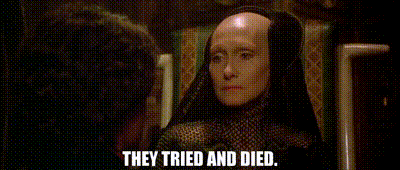 a woman with a bald head is sitting next to a man and says `` they tried and died '' .