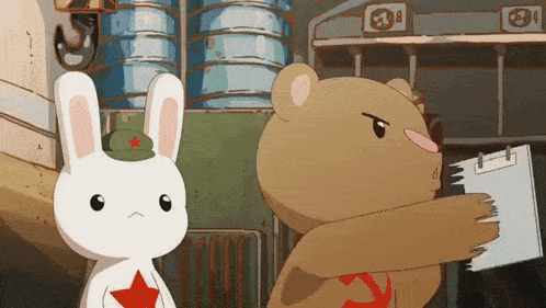 a teddy bear is holding a piece of paper next to a white rabbit