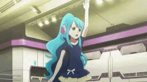 a girl with blue hair and headphones is standing in a room